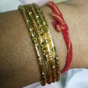 AVON 4 BANGLES SET