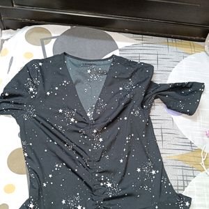 Get Free Delivery On This Starry Black Top. No Damage.