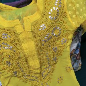 Yellow Chikankari Kurta And White Flared Palazzo