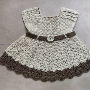 A Beautiful Crochet Dress For Baby Girl