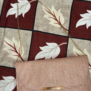 Pink Shimmery Sling Bag.