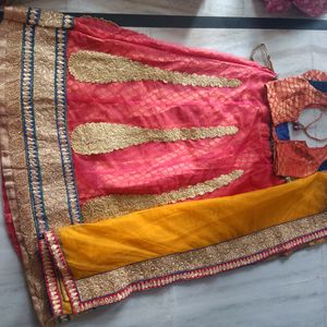 Peach and yellow netted hals saree.