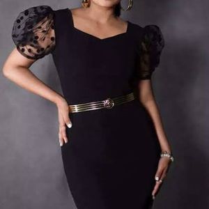 Black bodycon dress with puff sleeves