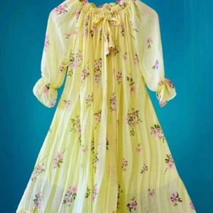 A flowing beautiful Yellow Color western dress