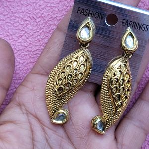 2 Pink And Golden Earrings Set