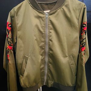 Olive Green jacket.