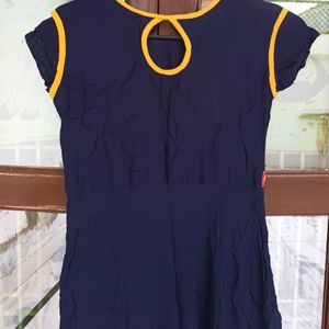 Flared Women Kurti With Rajasthani Work .