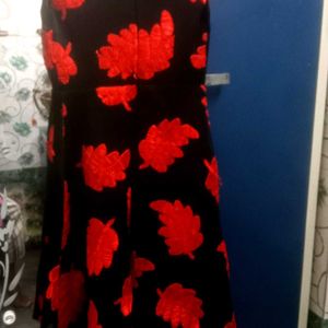 Black V Neck Gown With Red Leaves