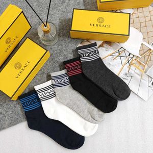 Luxury Branded Socks Next To Original