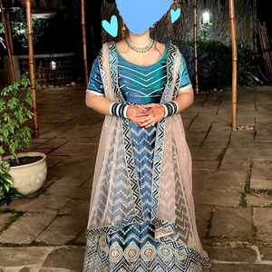 Peacock Blue And Peach Lehenga