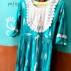 A Beautiful Kurti With White Embroidery Work