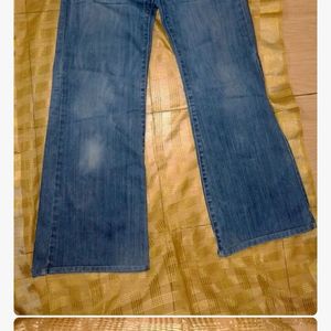 Faded Flared Jeans For Women