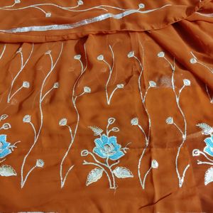 Beautiful Design Light Rust Color Saree