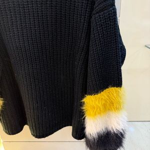 Feathered Sleeve High Neck Sweater