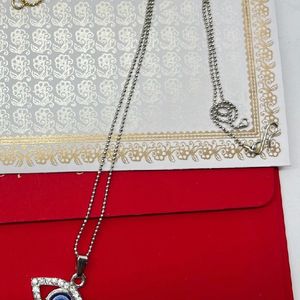 Silver Evil Eye Chain And Locket