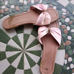 Flowered Flip flops .