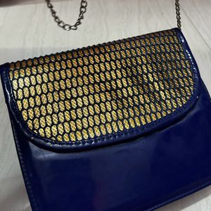 Gold Toned Blue Bag