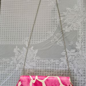 Pink & white Clutch with a silver sling