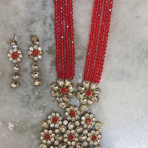 A Red Beads Jewellery with heavy locket& earrings