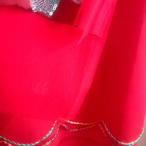 A Beautiful Red Colour Plain Saree With Designer B