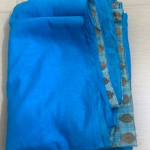 Blue Saree With Golden Border