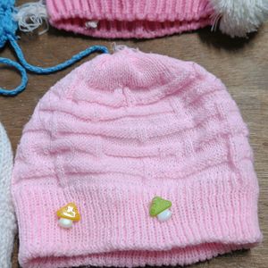 4 Winter Caps Nd 3 Pair Of Booties