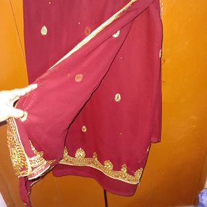 Beautiful maroon heavy bridal saree