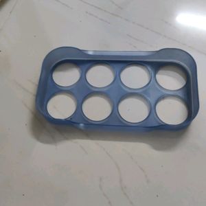 Ice cube maker and egg setter