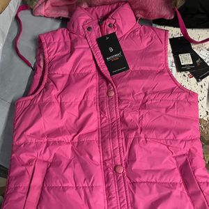 Brand new pink sleeveless jacket with hoodie