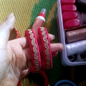 hand made silk thread  bangles. Colour - bright re