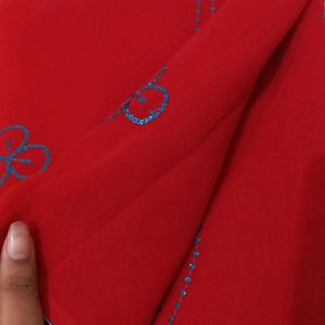 RED SAREE WITH BLUE SEQUIN WORK