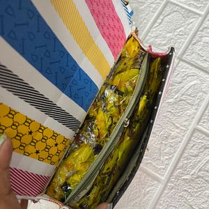 Multicoloured hexagonal sling bag