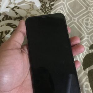 iphone xs with charger and 2 covers