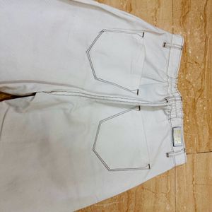 White Straight Fit Jeans With Brown Border