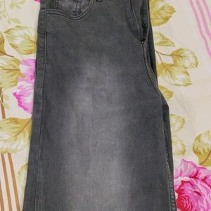 Black Jeans With Faded Pattern On Front