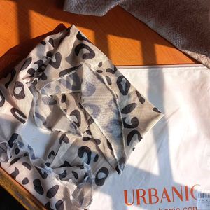 BRAND NEW URBANIC top with White Leopard Print.