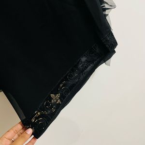 Women Black Saree With Frills And Blouse