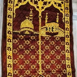 Muslims Prayer Mats And A Poster