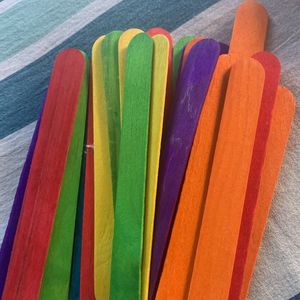 Colourful Sticks And Cotton Pom Po