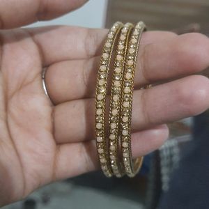 Golden stone bangles