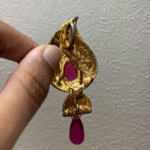 Pendant In Studded Pattern With Pink Drop Design