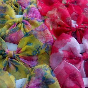 4 Georgette Red And Yellow Printed Bows