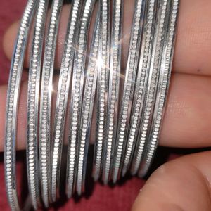 Silver and Grey Metal Bangles