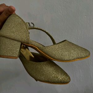 Golden glitter heel