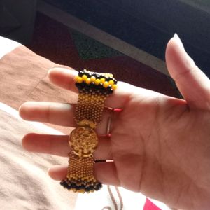 Unused Yellow Bracelet With Black Pearl