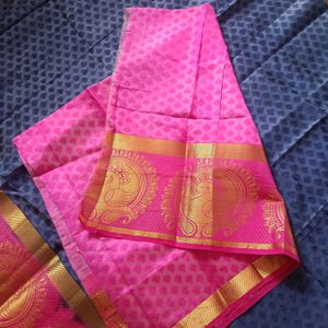 A Pattu Navy Blue nd Pink Coloured Saree.