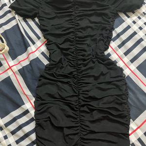 black ruffled mini dress