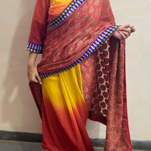 YELLOW ORANGE SHIFFON AND HEAVY EMBROIDERY SAREE