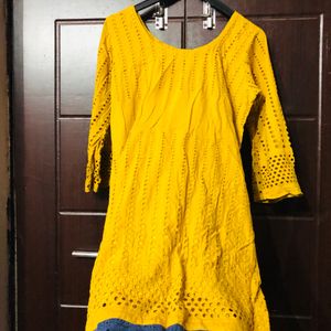 yellow kurta and blue trouser suit