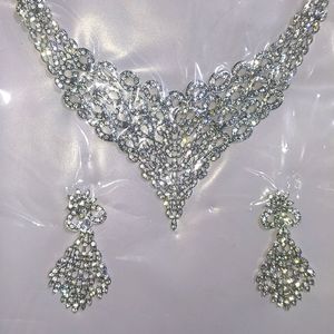 white chain set with earrings